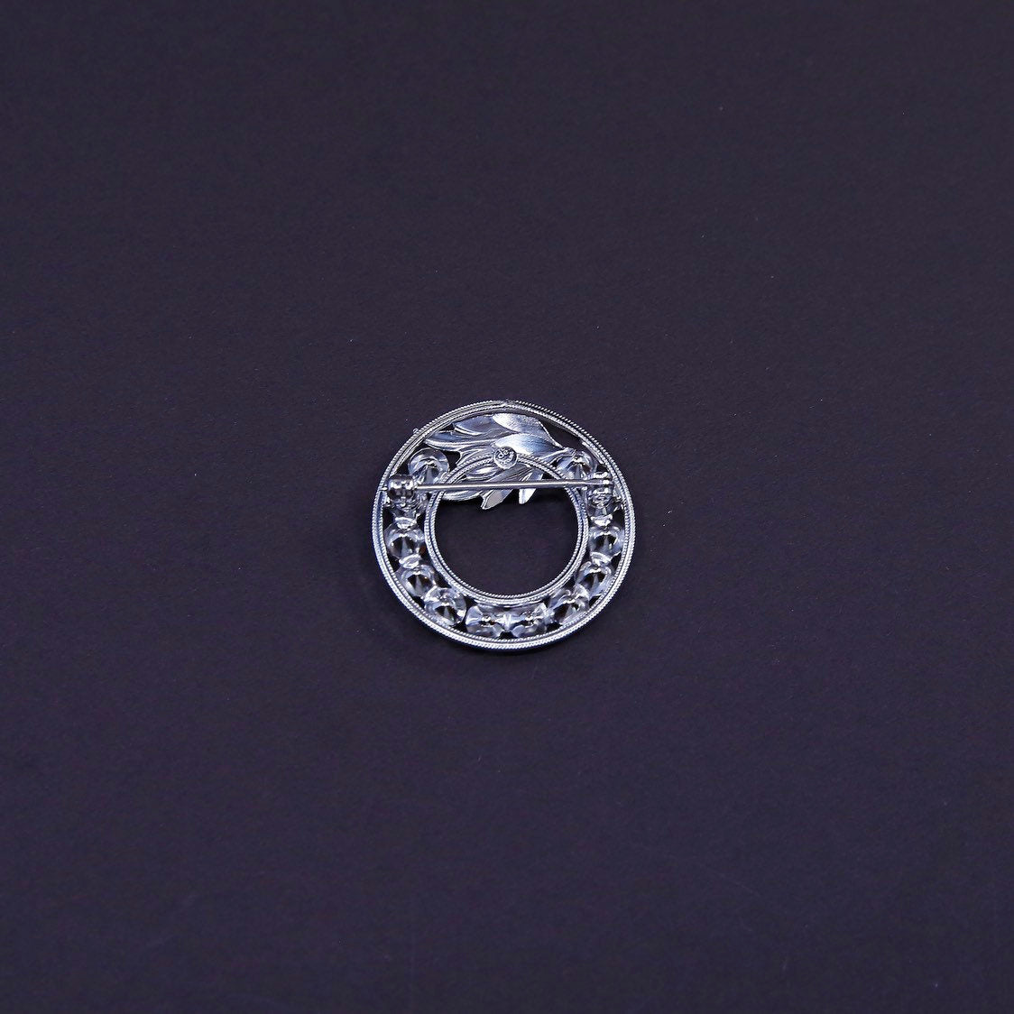 Vintage sterling 925 silver flower circle brooch with crystal and leaves