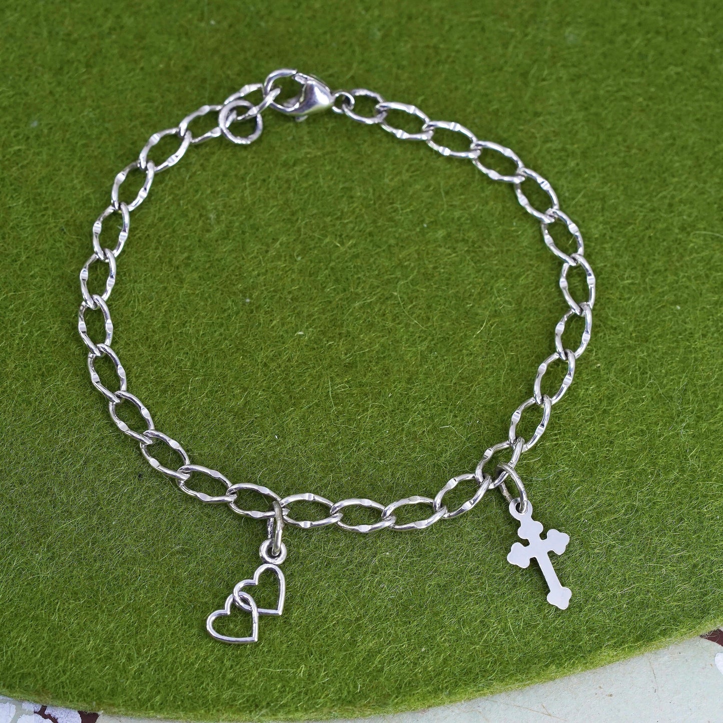 6.75”, sterling 925 silver twisted curb bracelet and cross double heart charms
