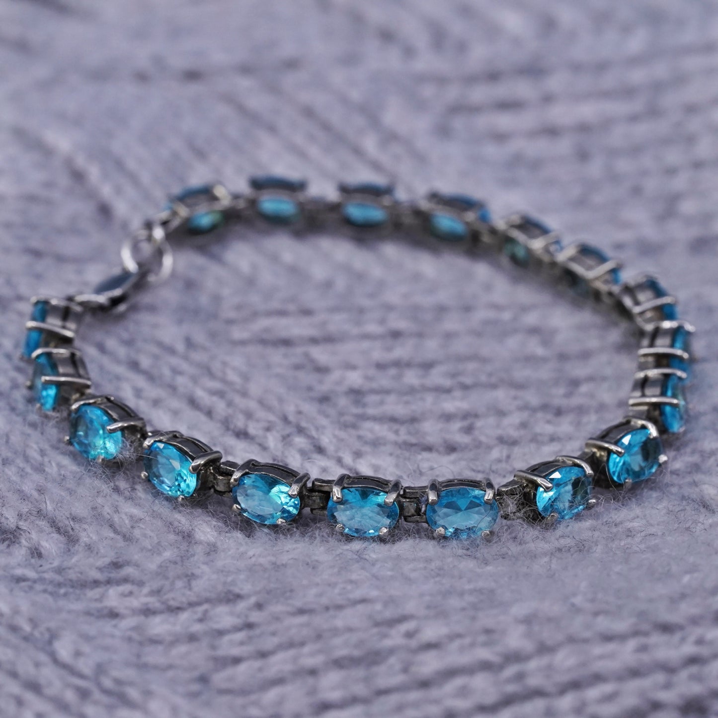7.5", vintage Sterling 925 silver tennis bracelet with blue topaz