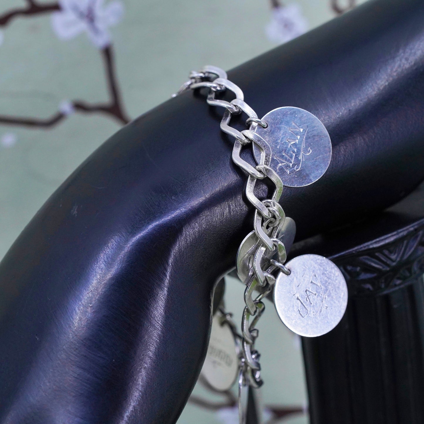 6.75" sterling silver bracelet, 925 curb link chain with charms embossed names