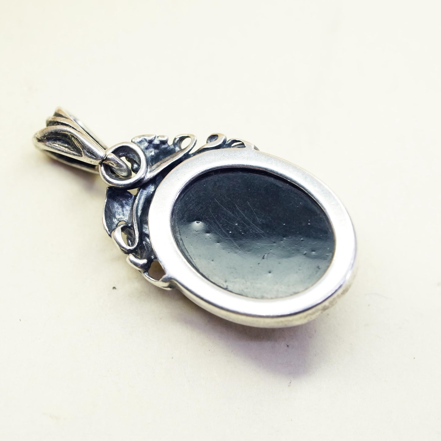 Vintage sterling 925 silver handmade pendant with amber and leaves details