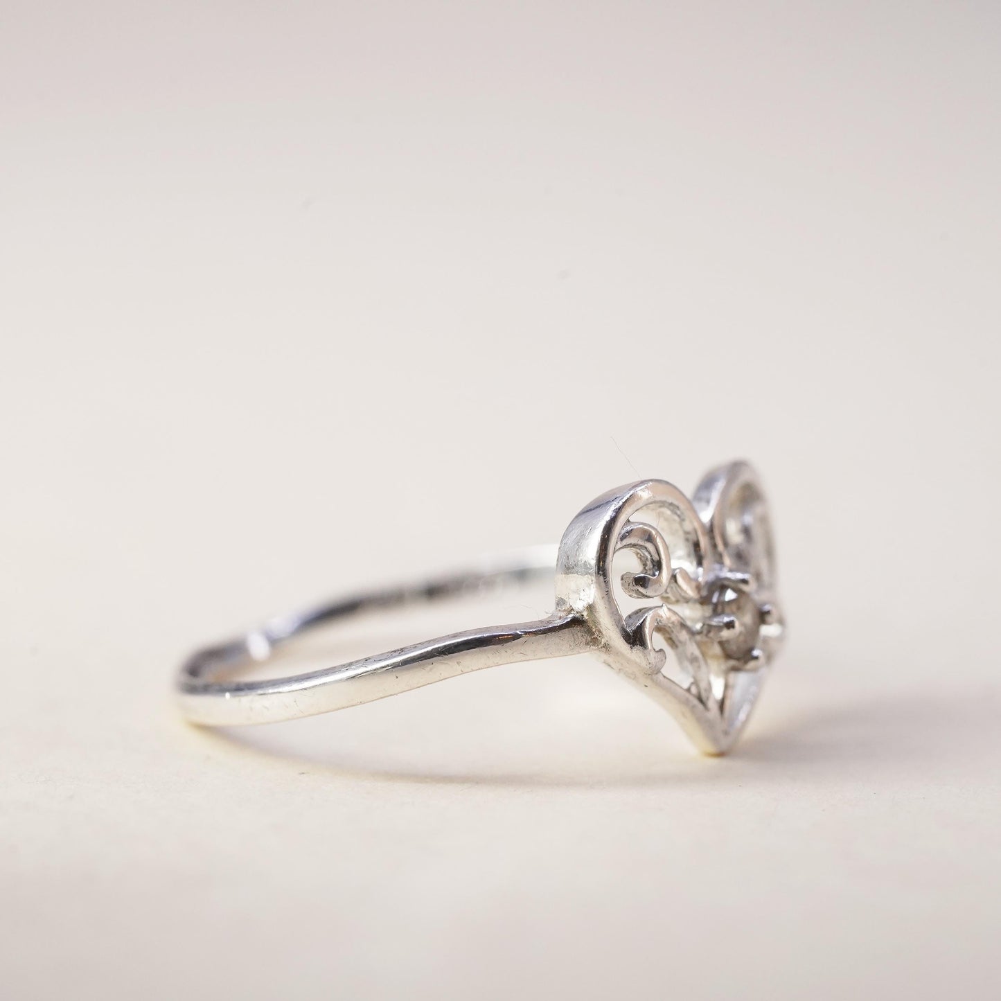 Size 7.25, Vintage sterling silver handmade ring, swirly heart ring with cz