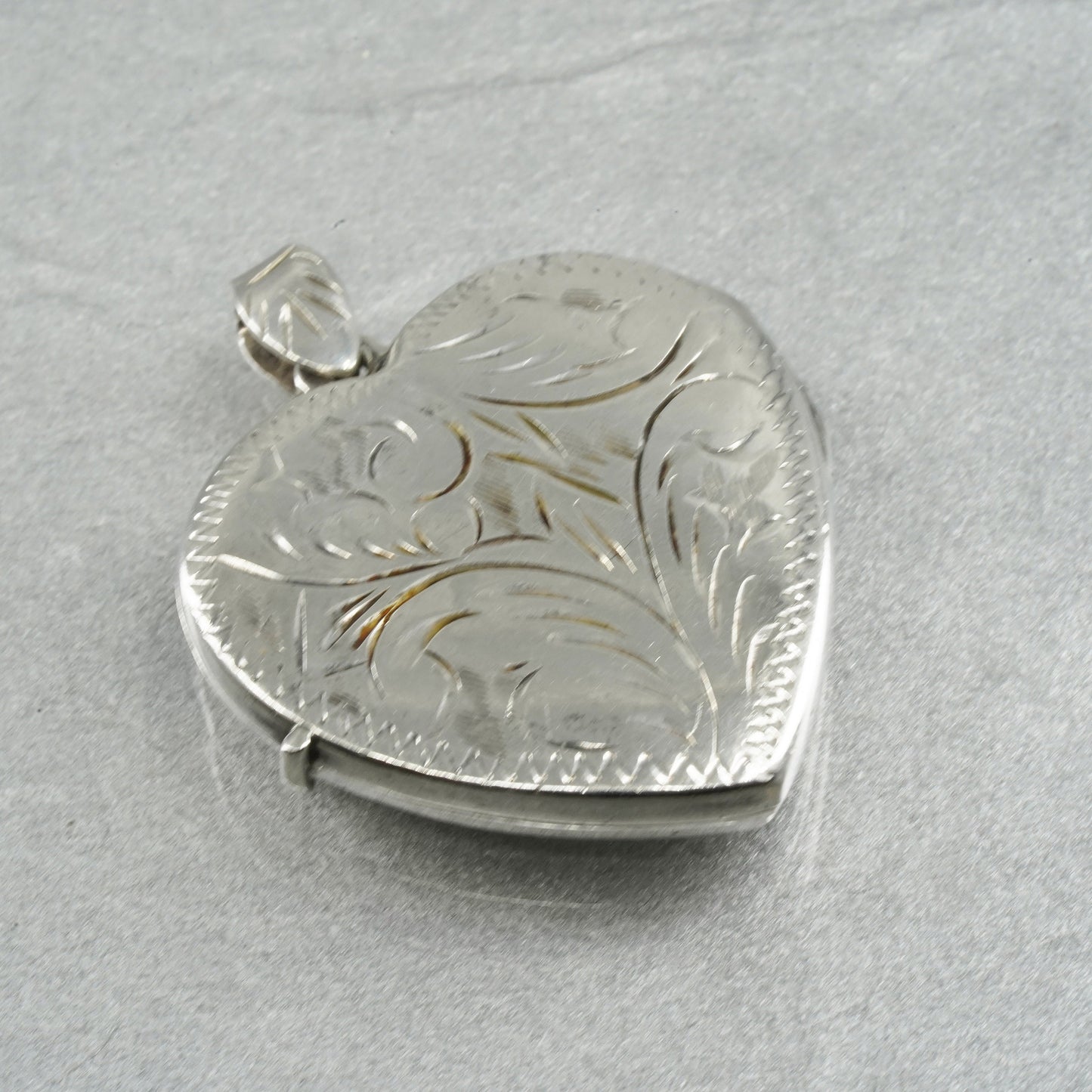 Vintage Sterling silver handmade charm, textured 925 heart photos locket