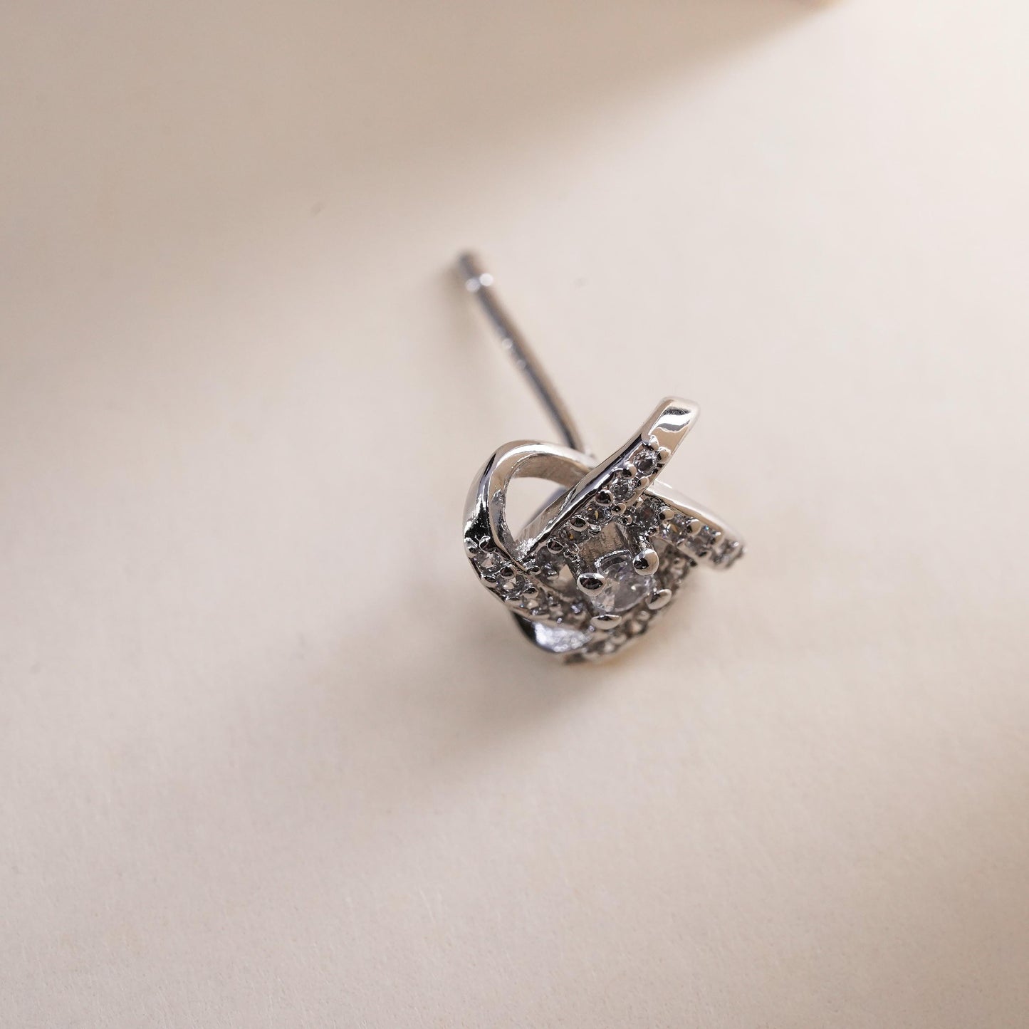 Vintage handmade single earring. Sterling 925 silver cz entwinted stud