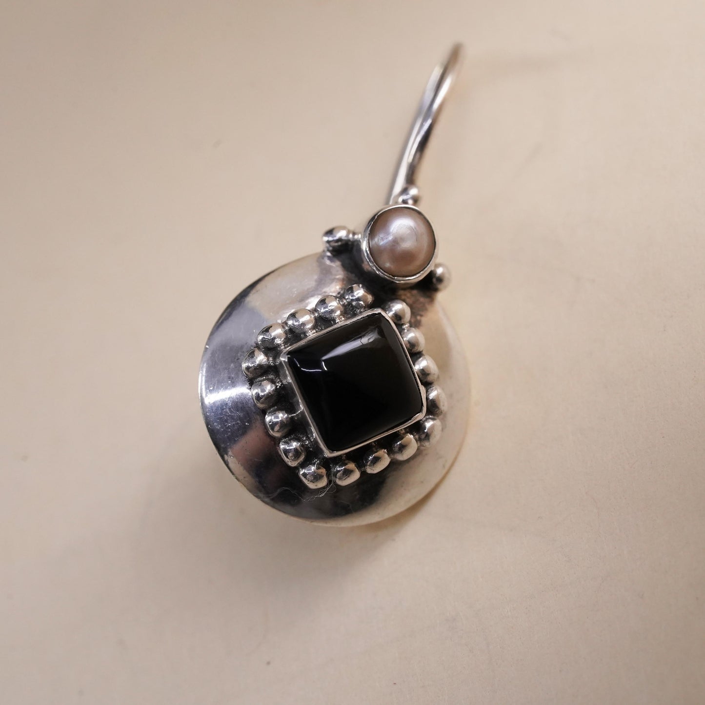 Vintage handmade single earring. Sterling 925 silver hook with onyx and pearl
