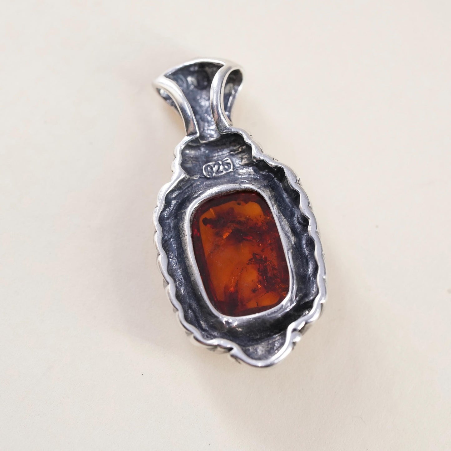 Vintage Sterling 925 silver handmade pendant with amber and cable around