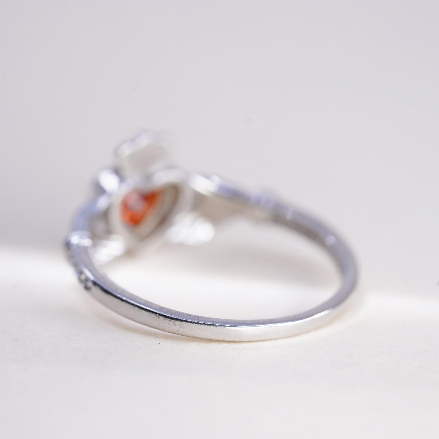 Size 8, Irish sterling 925 silver claddagh ring, holding heart, orange crystal