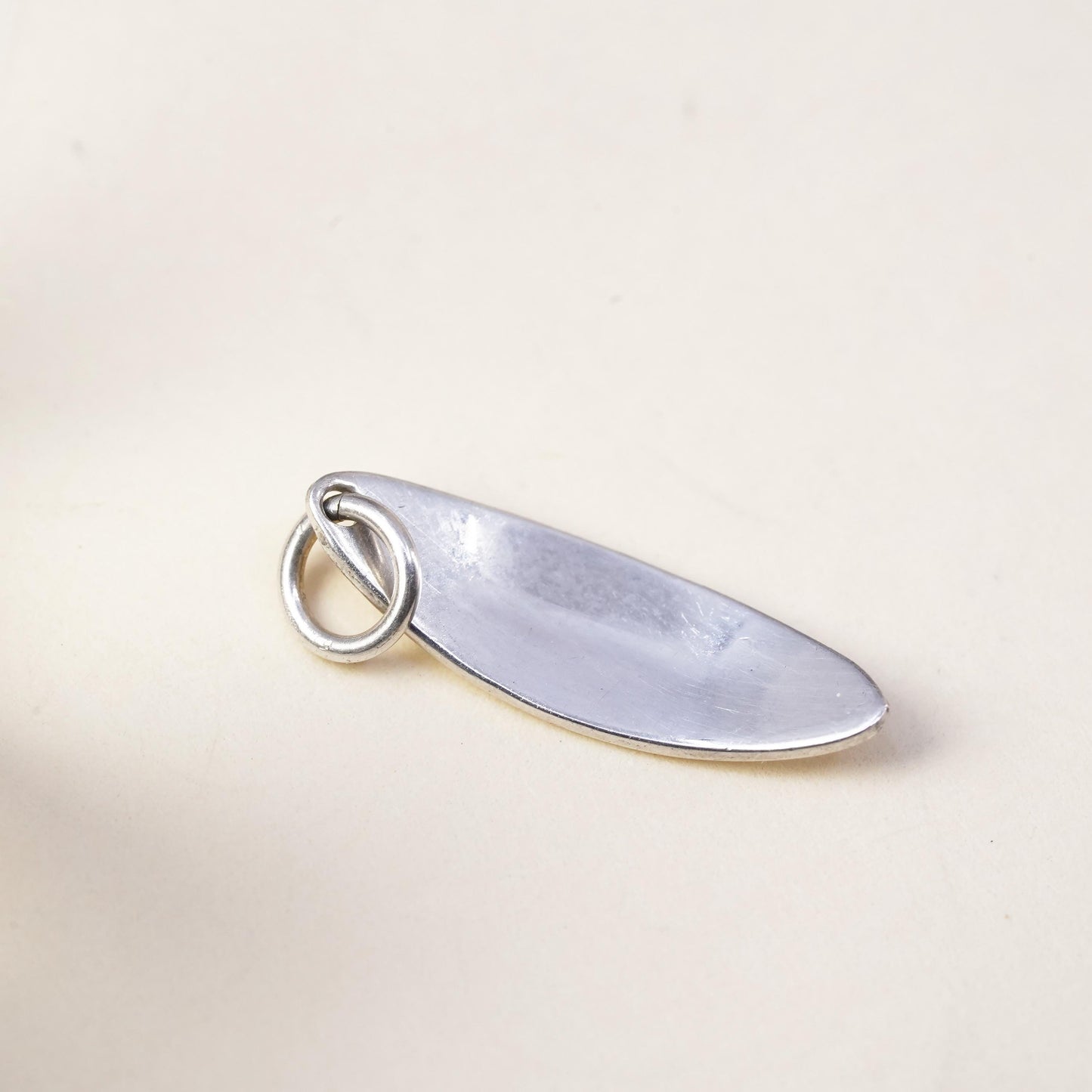 Vintage sterling silver tag charm embossed “laugh” 925 pendant, silver tested