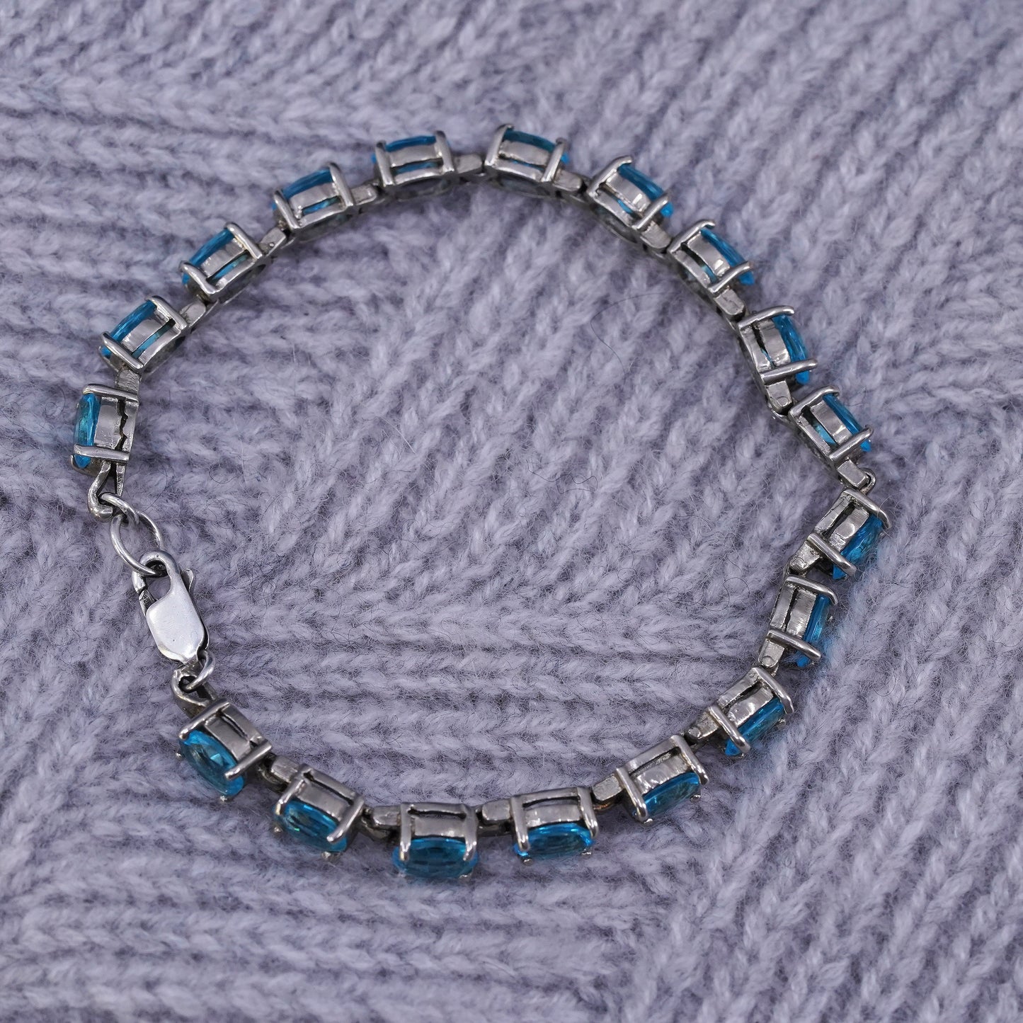 7.5", vintage Sterling 925 silver tennis bracelet with blue topaz
