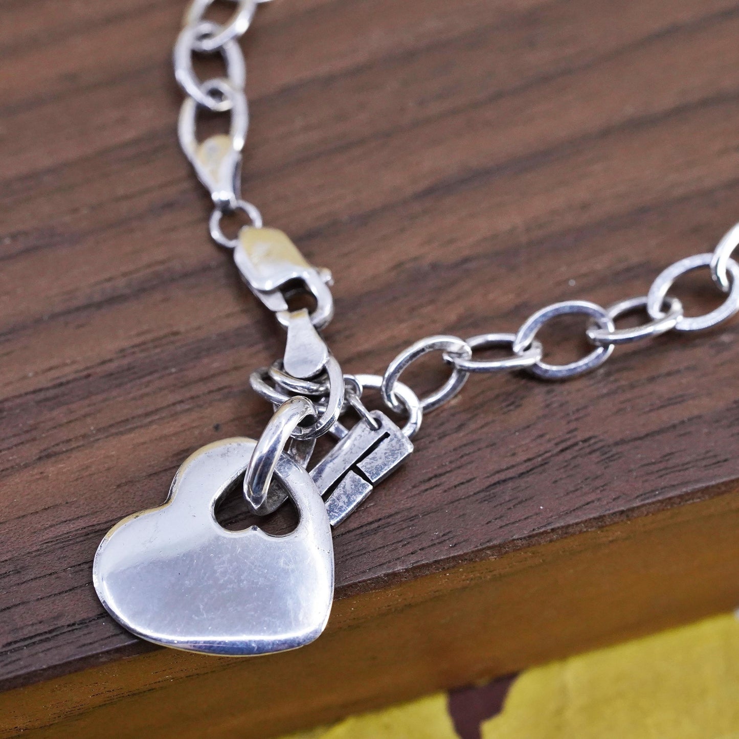 6.75”, vintage Sterling silver charm bracelet, 925 oval chain heart tag charm