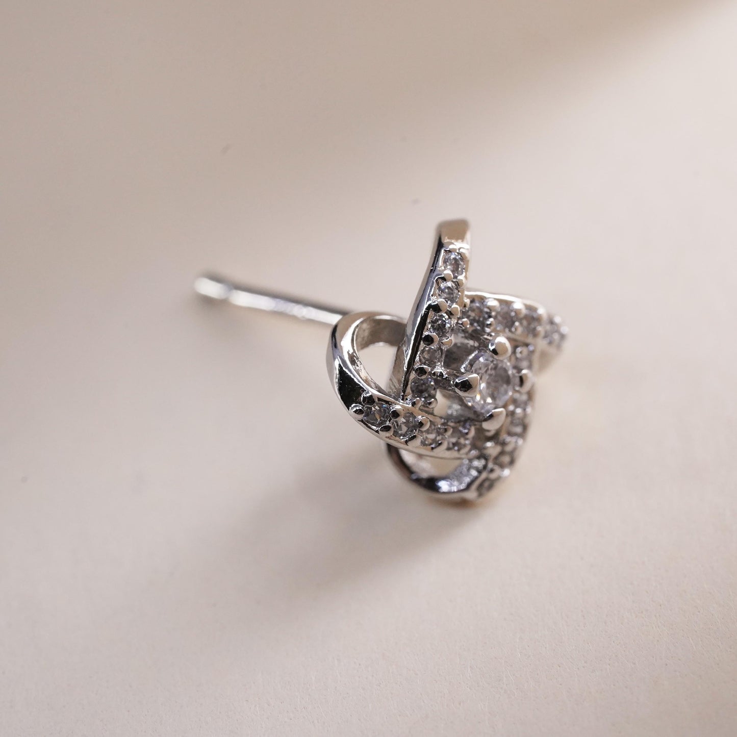 Vintage handmade single earring. Sterling 925 silver cz entwinted stud