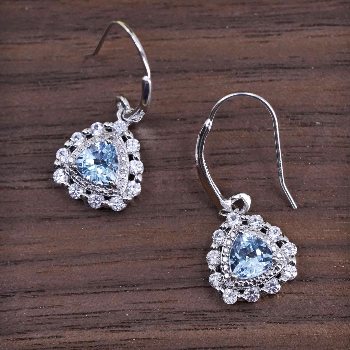 Vintage sterling 925 silver handmade earrings with blue topaz and cz around