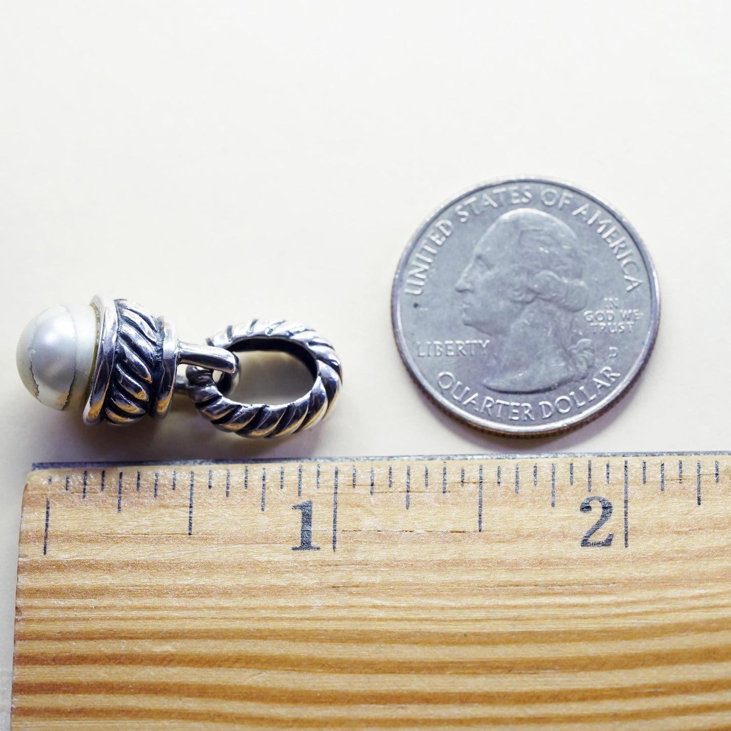 Vintage silver tone charm pendant with faux pearl and cable details