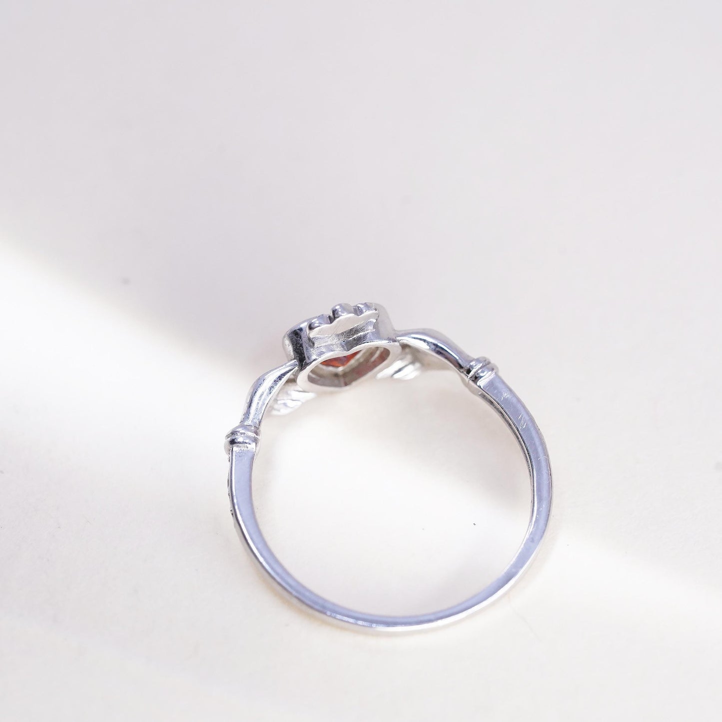 Size 8, Irish sterling 925 silver claddagh ring, holding heart, orange crystal
