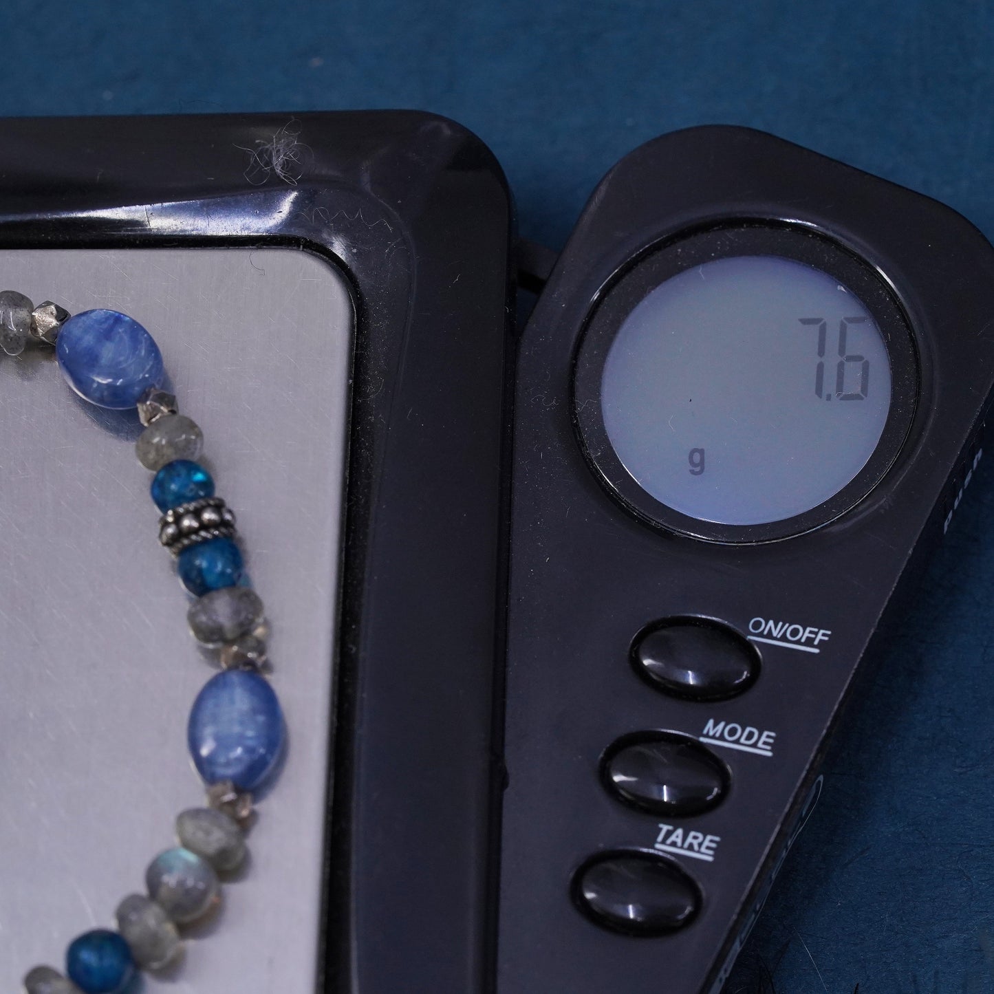 7.75”, sterling silver bracelet with blue Swarovski crystal moonstone beads