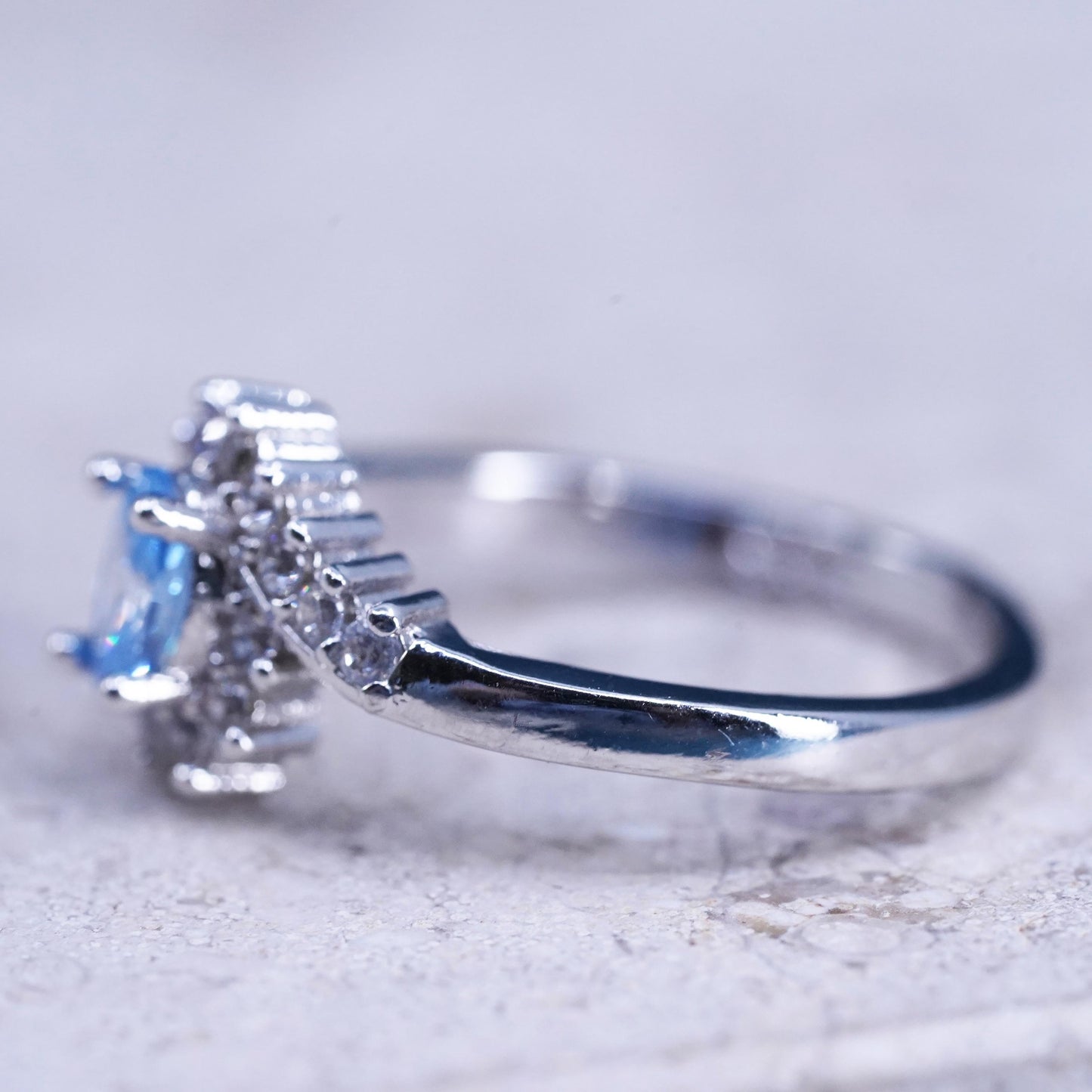 Size 7, vintage sterling 925 silver handmade ring with blue topaz and cz around