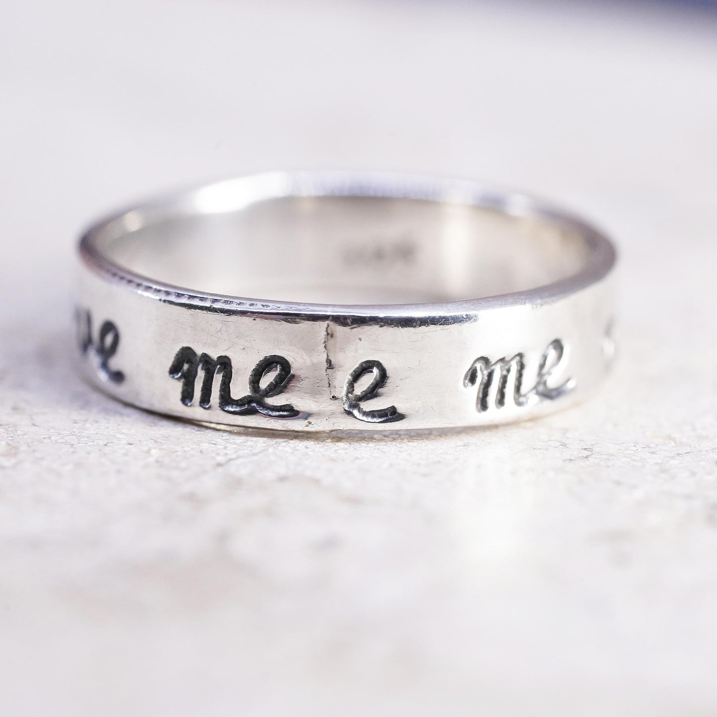 Size 6.25, VTG Sterling silver stackable ring, 925 band engraved "love me not"