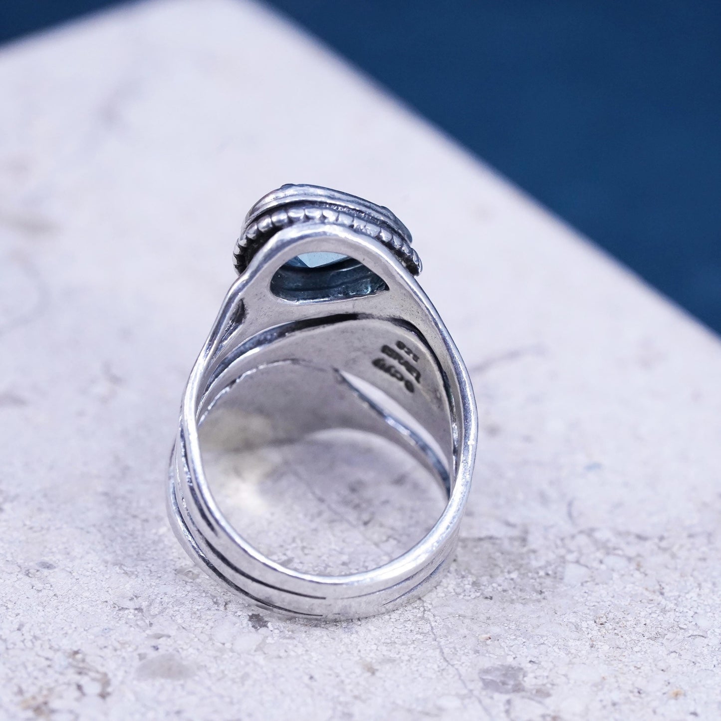 Size 8, vintage Israel Shablool Didae Sterling silver wavy ring with blue topaz