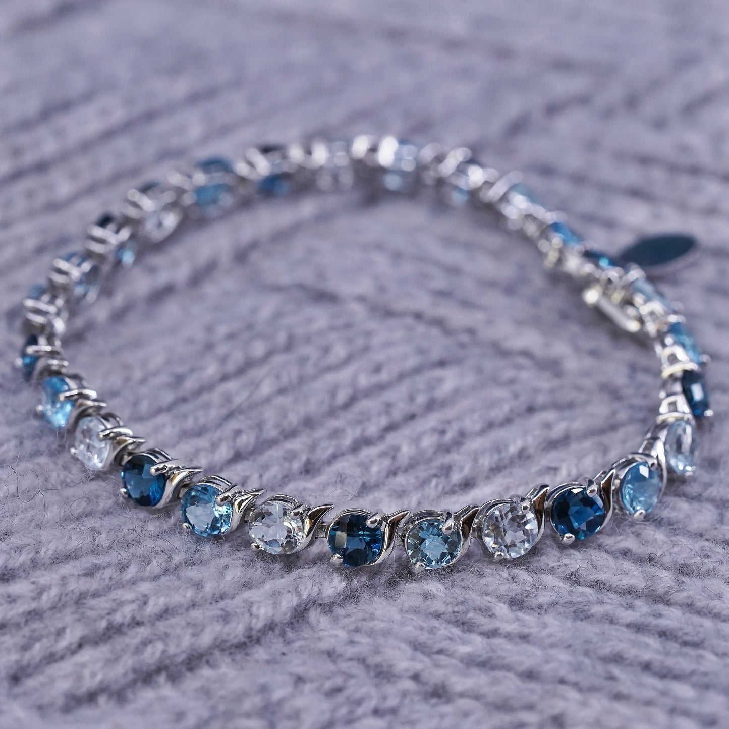 7", vintage Sterling 925 silver tennis bracelet with blue topaz