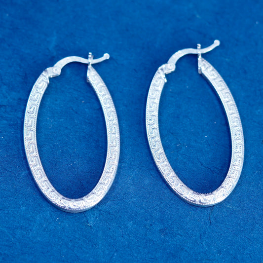 1.5”, Sterling silver earrings, 925 oval Greek key pattern engraved hoops