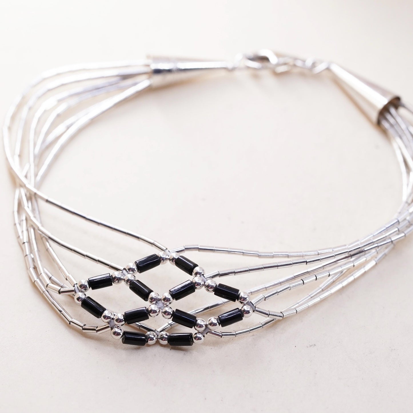 7”, Native American sterling bracelet, woven braided 925 liquid silver onyx