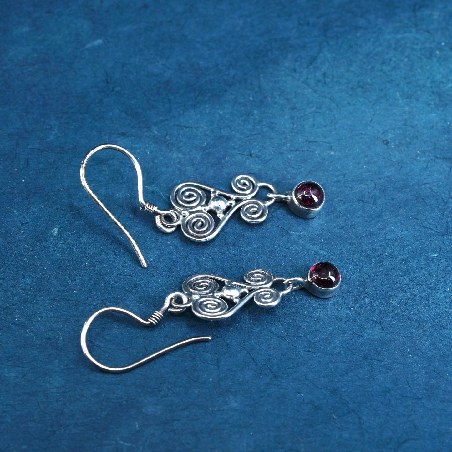 Vintage Sterling Silver handmade Earrings. 925 swirl dangles with garnet