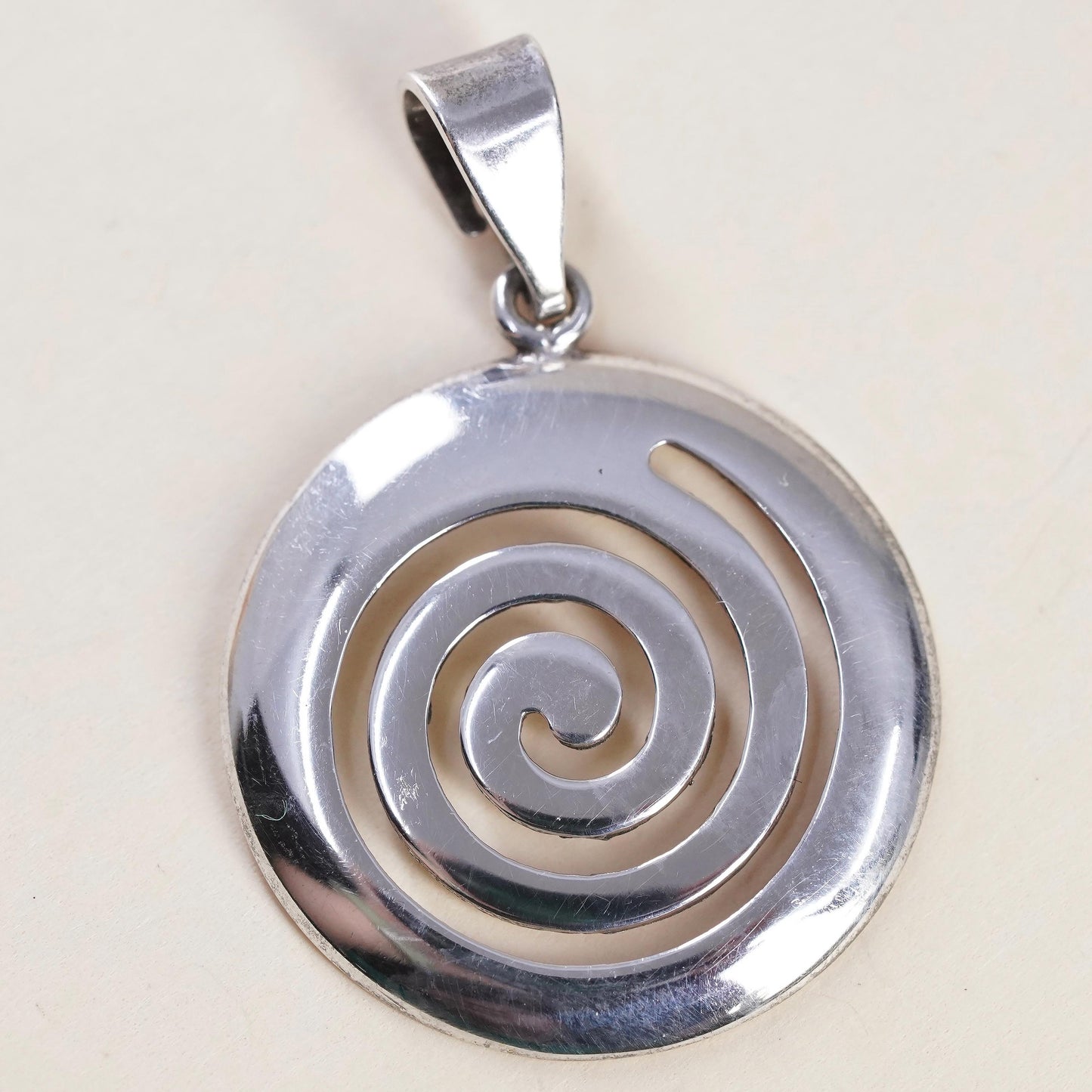 Vintage handmade Sterling silver pendant, 925 circle tag with spiral cut out