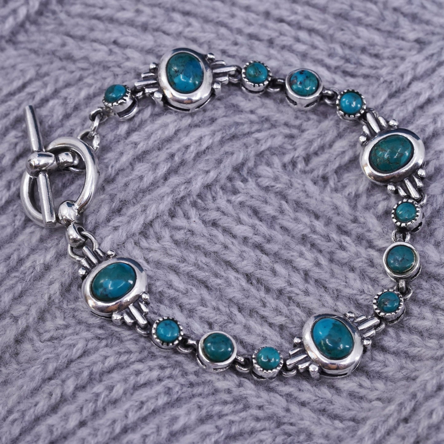 6.75”, sterling 925 silver handmade bracelet with turquoise and toggle closure