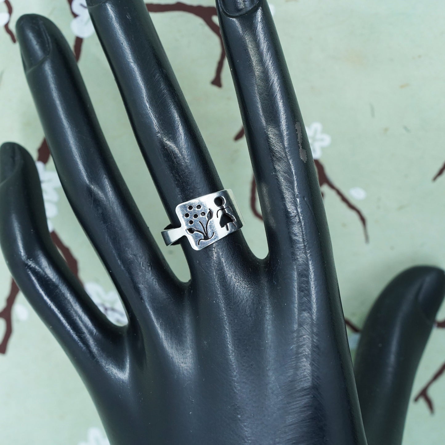 Size 6, sterling silver handmade ring, 800 band with flower and girl cut out