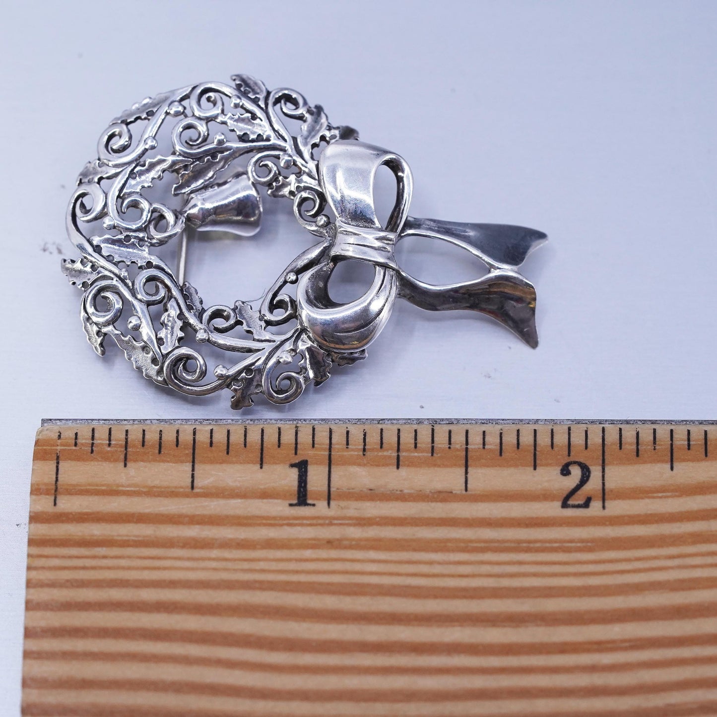 Vintage Jez Jezlaine 925 Sterling Silver wreath with ribbon and bell Brooch Pin