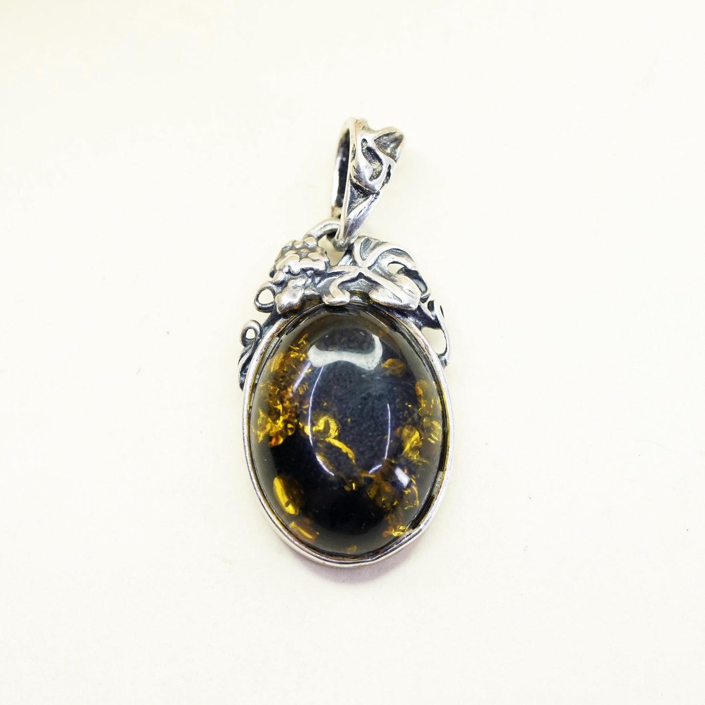 Vintage sterling 925 silver handmade pendant with amber and leaves details