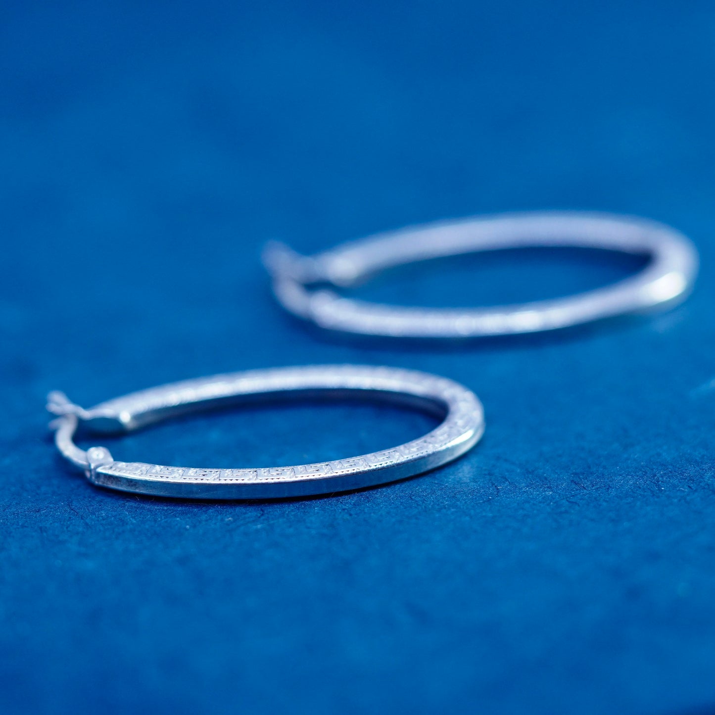 1.5”, Sterling silver earrings, 925 oval Greek key pattern engraved hoops