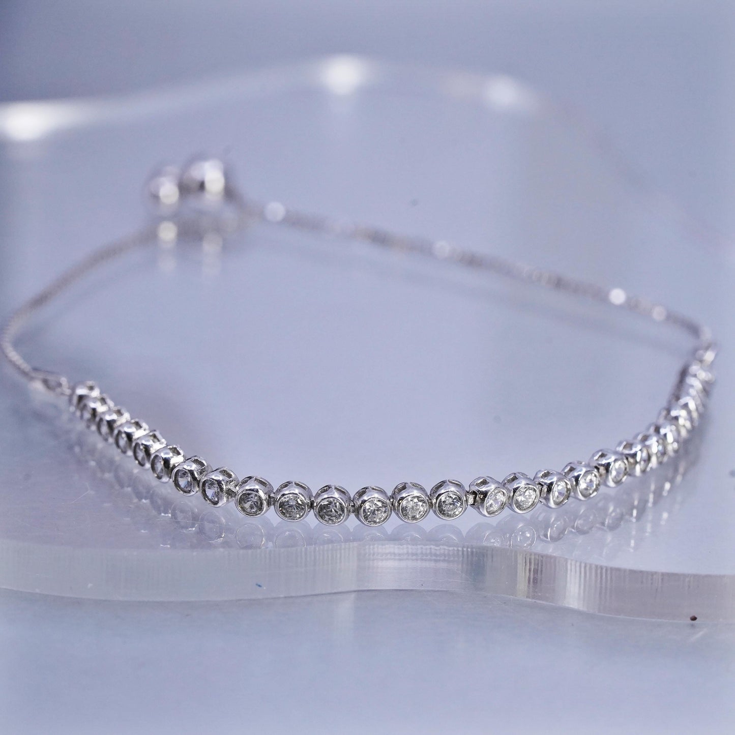 Size adjustable. Sterling 925 silver tennis bracelet, box chain cluster cz bar