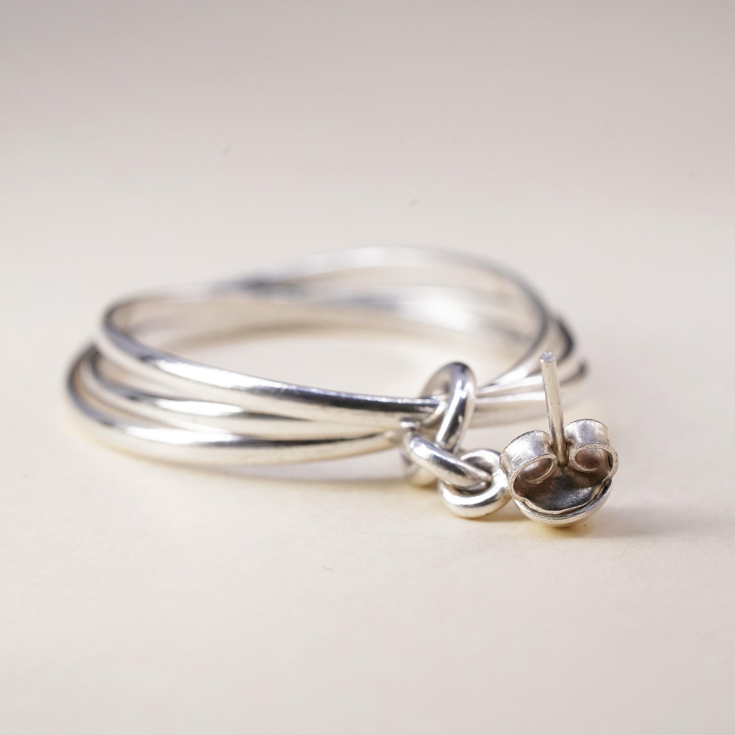 1.75", Vintage sterling 925 silver single earring, entwined minimalist hoops