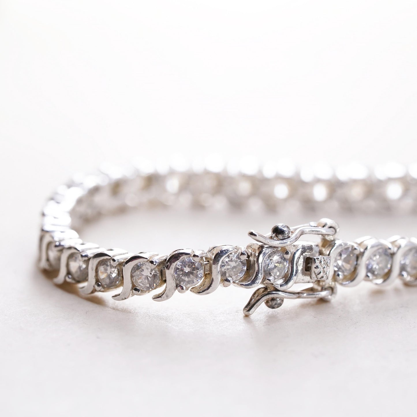 7.25", Vintage Sterling 925 silver tennis bracelet with cluster cz