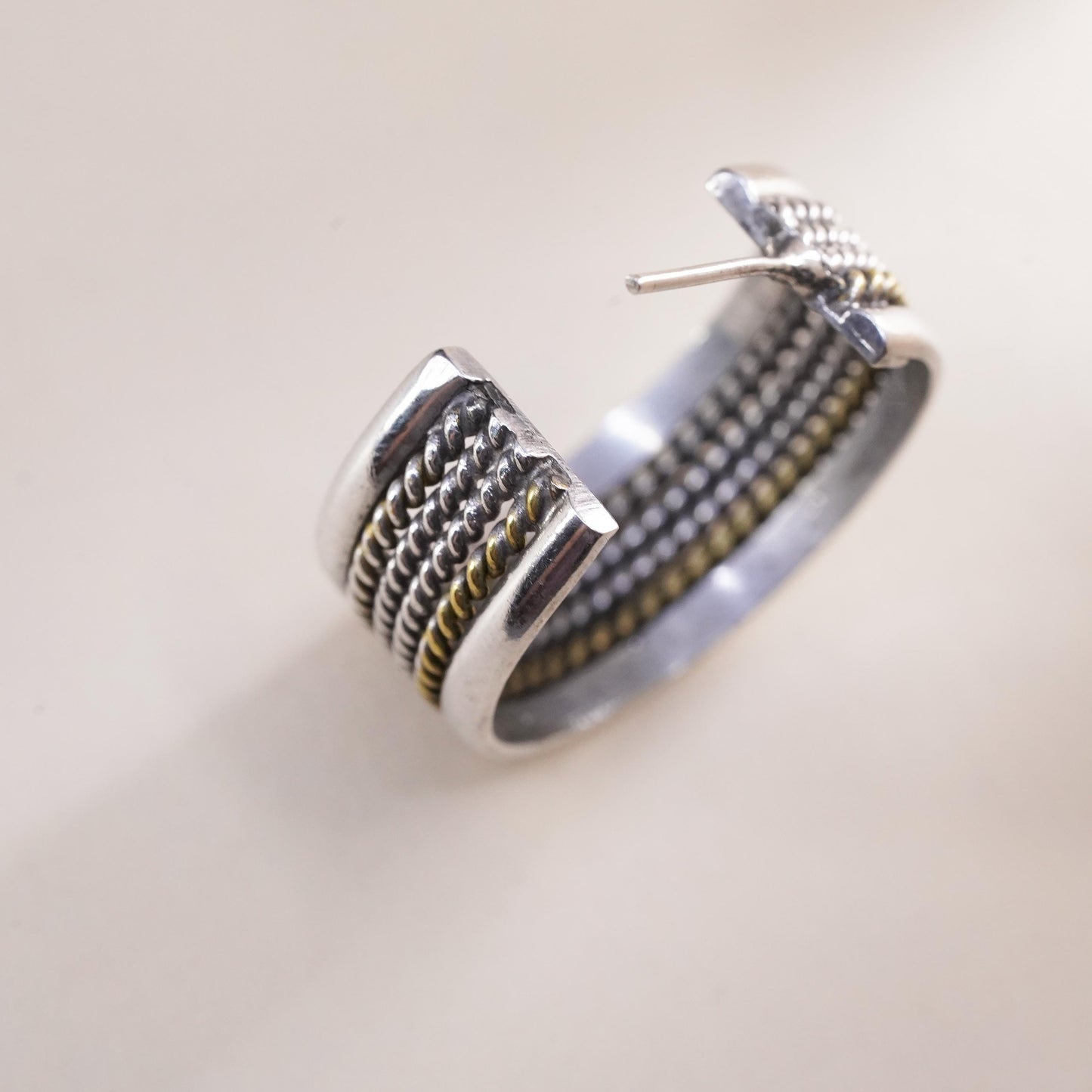 Vintage two tone Mexican single earring. Sterling 925 silver huggie stud