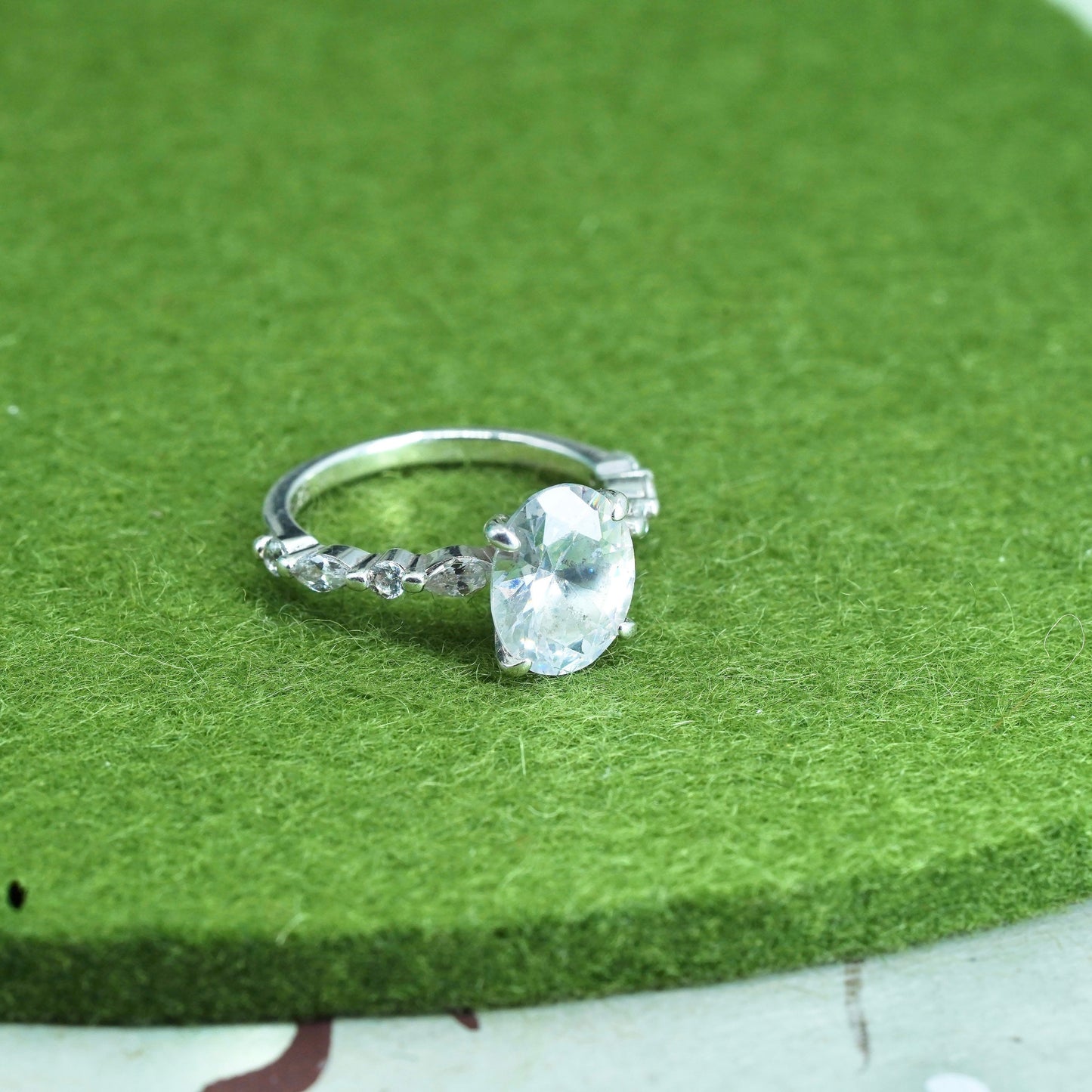 Size 5, Sterling 925 silver engagement ring with oval cut CZ and cluster cz