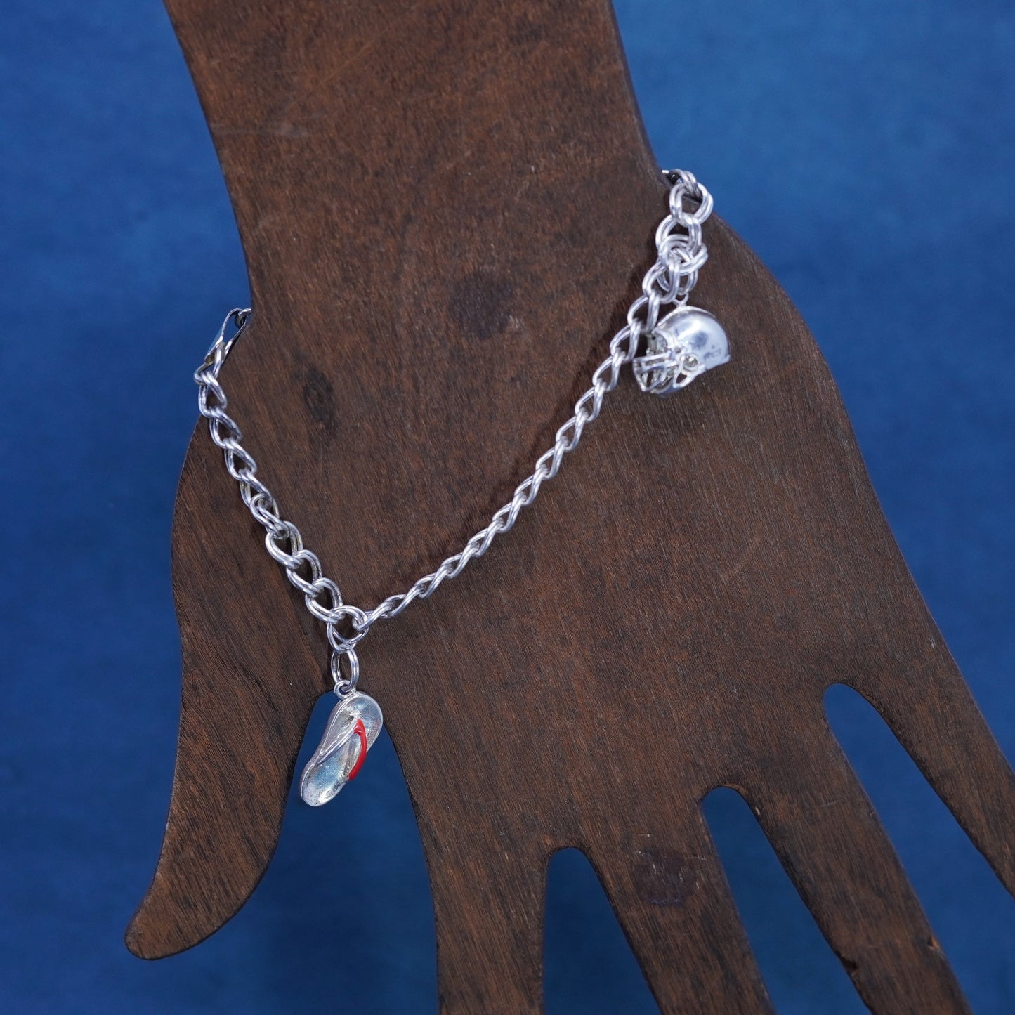 7.5”, Vtg Sterling silver 925 bracelet, curb chain football, flip-flop charms
