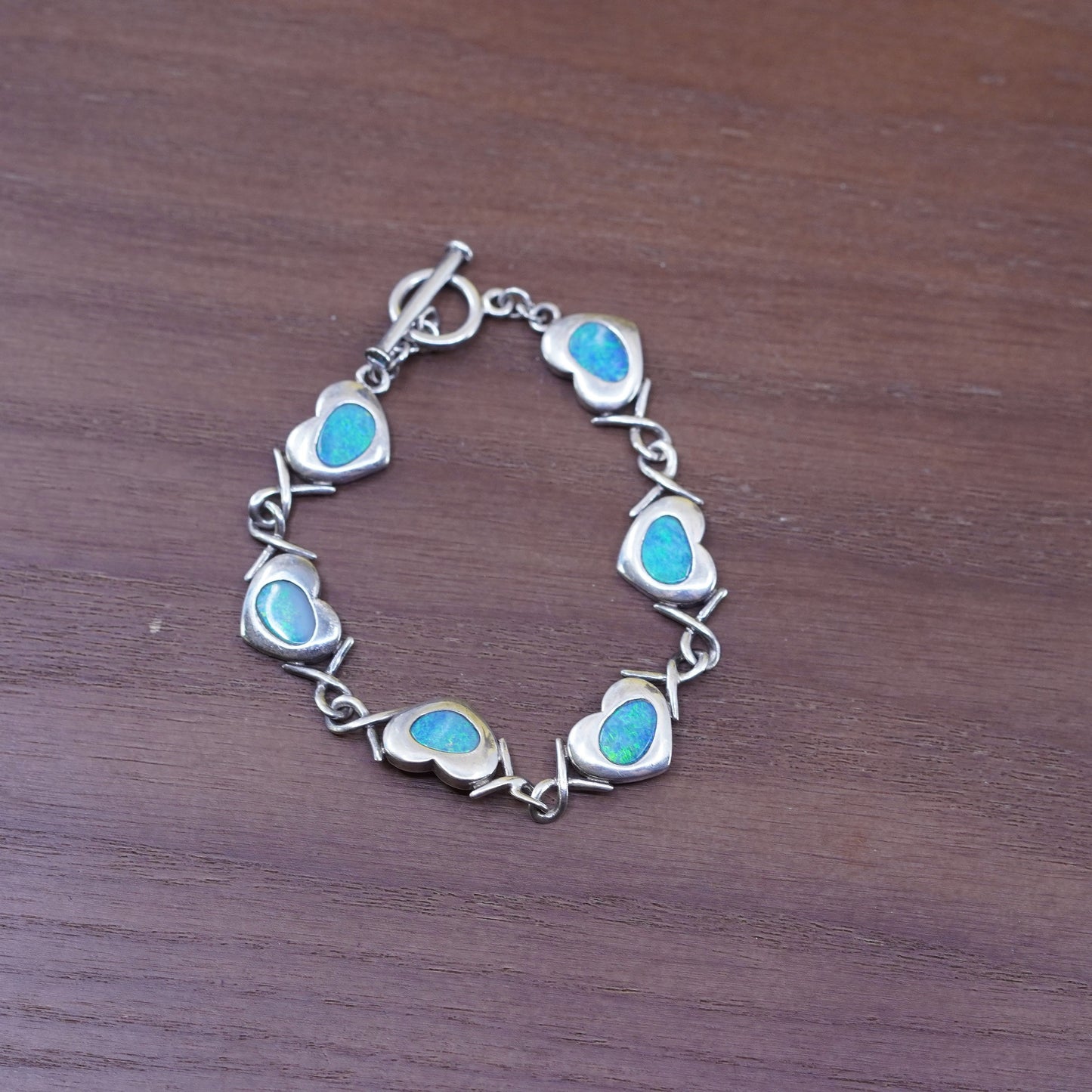 5.75”, vintage Sterling 925 silver heart chain bracelet w/ blue fire opal inlay