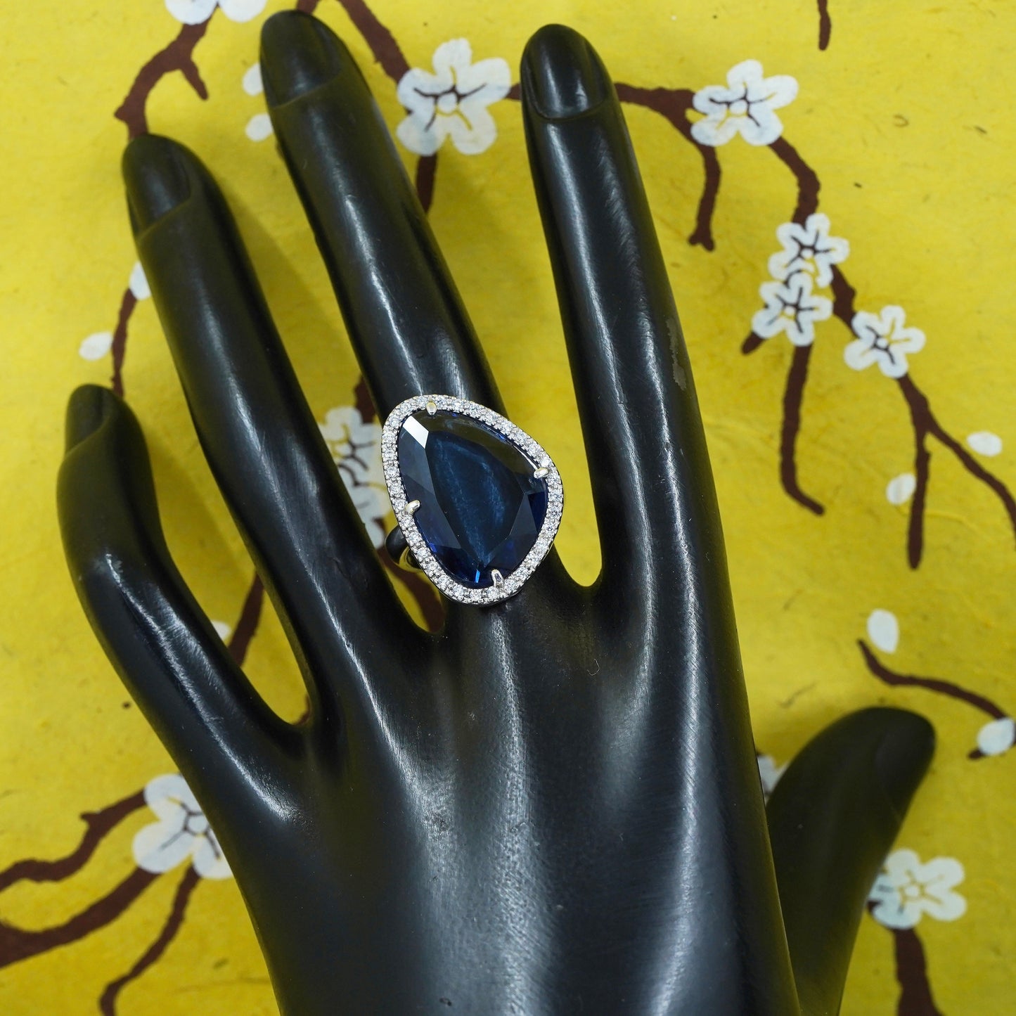 Size 7.25, vintage Sterling 925 silver ring with blue crystal and cz around