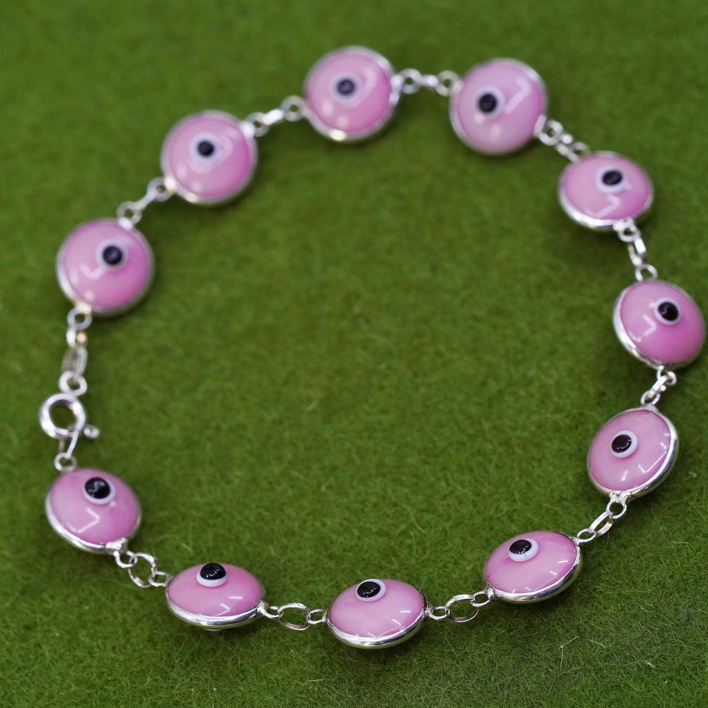 6.75”, vintage handmade sterling silver bracelet, pink glass evil eye beads