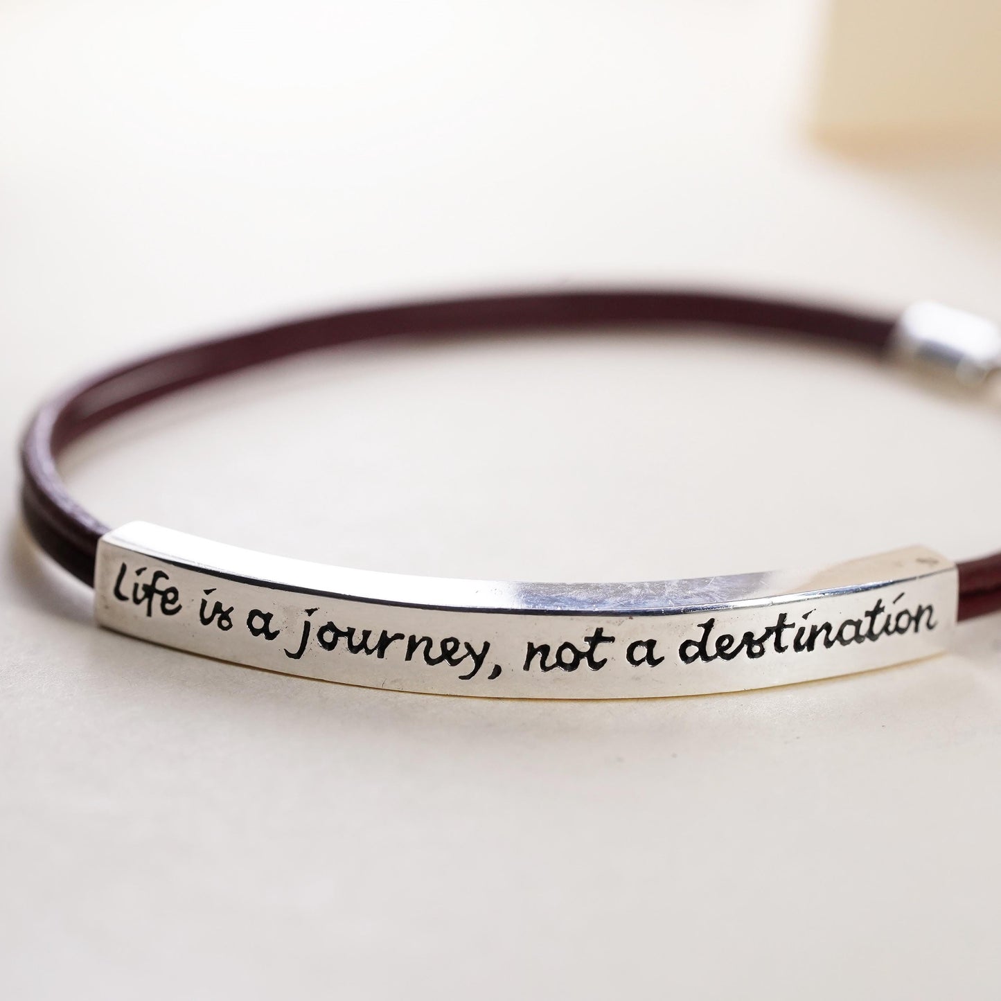 7.5", Vintage Baroni brown leather strap with 925 Sterling silver quote bar