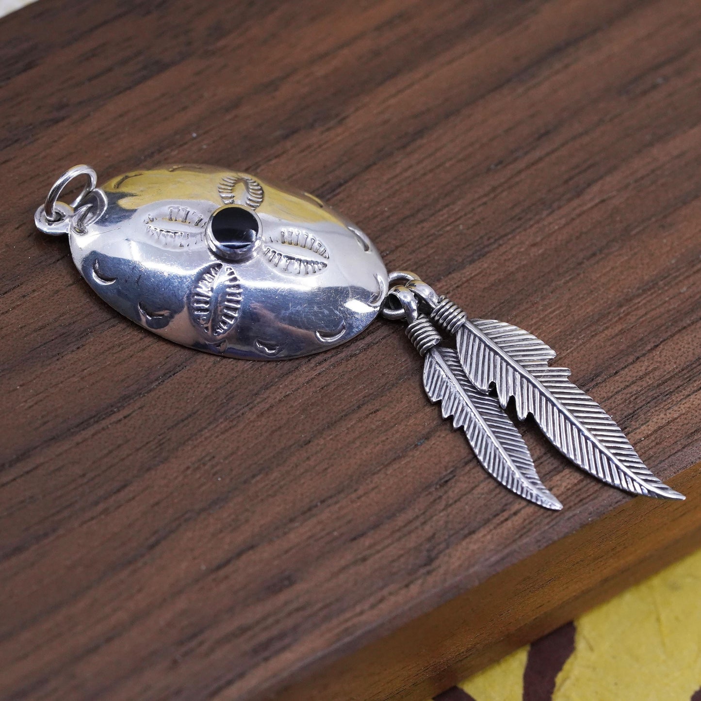 Sterling silver pendant, southwestern style, 2” 925 circle with feather dangle