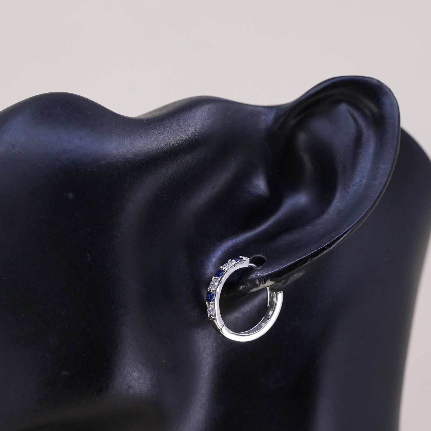 0.75”, sterling silver single earring, 925 huggie hoop with sapphire and cz