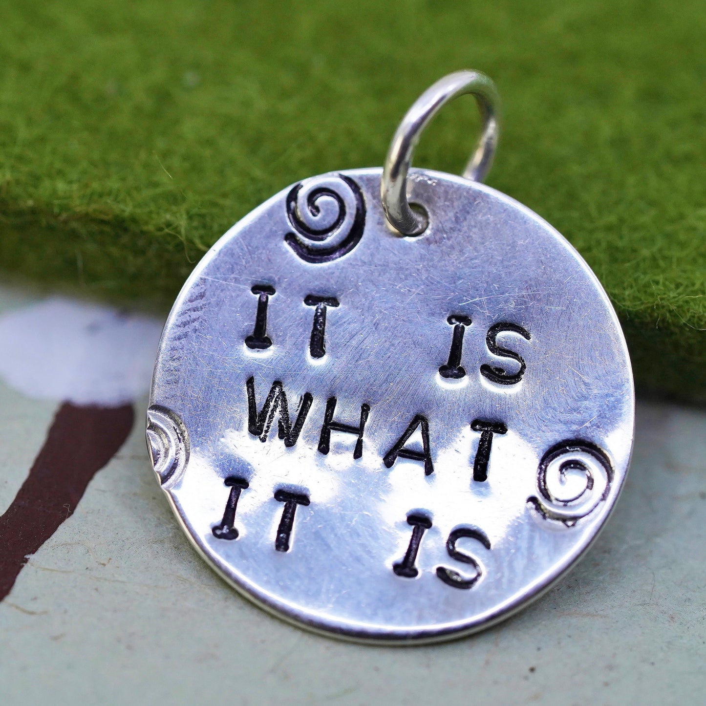 sterling silver handmade pendant, circle tag charm embossed “it is what it is”