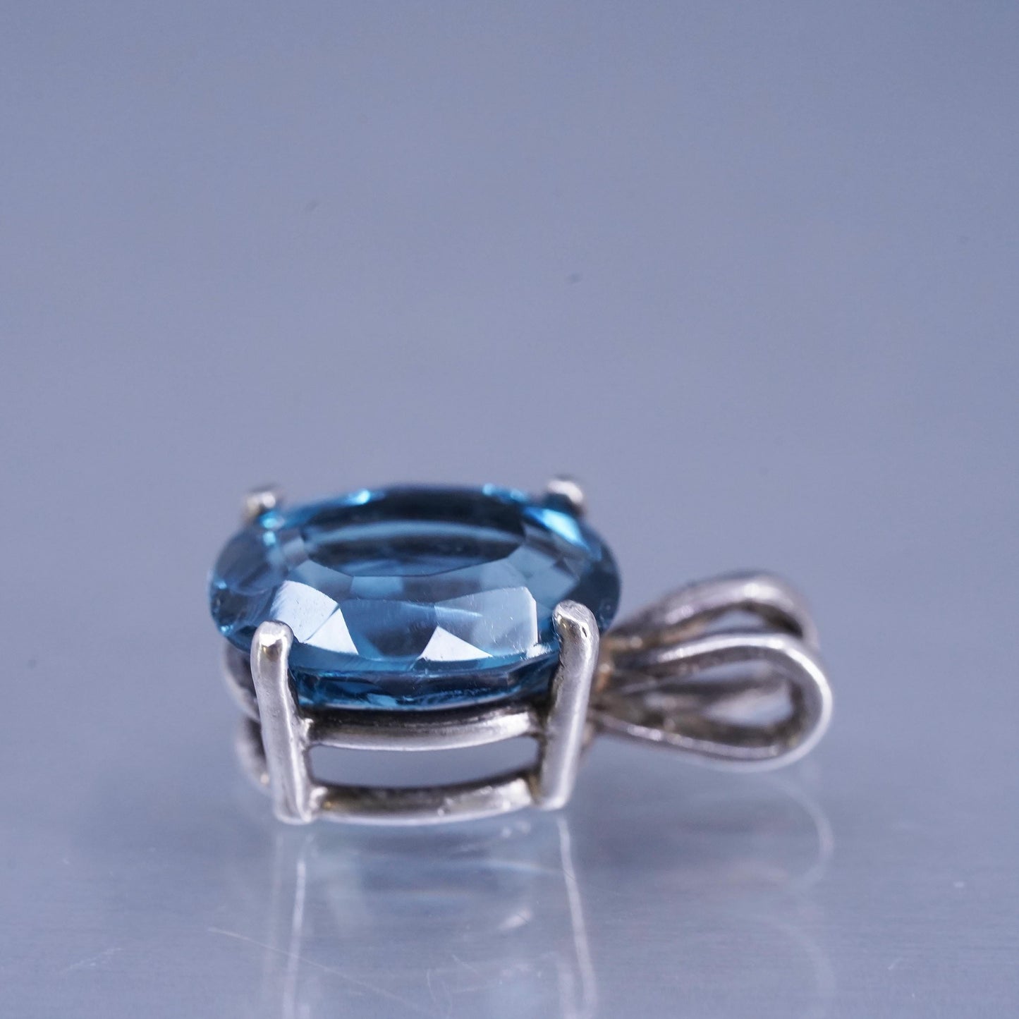 Vintage sterling 925 silver oval pendant with blue topaz