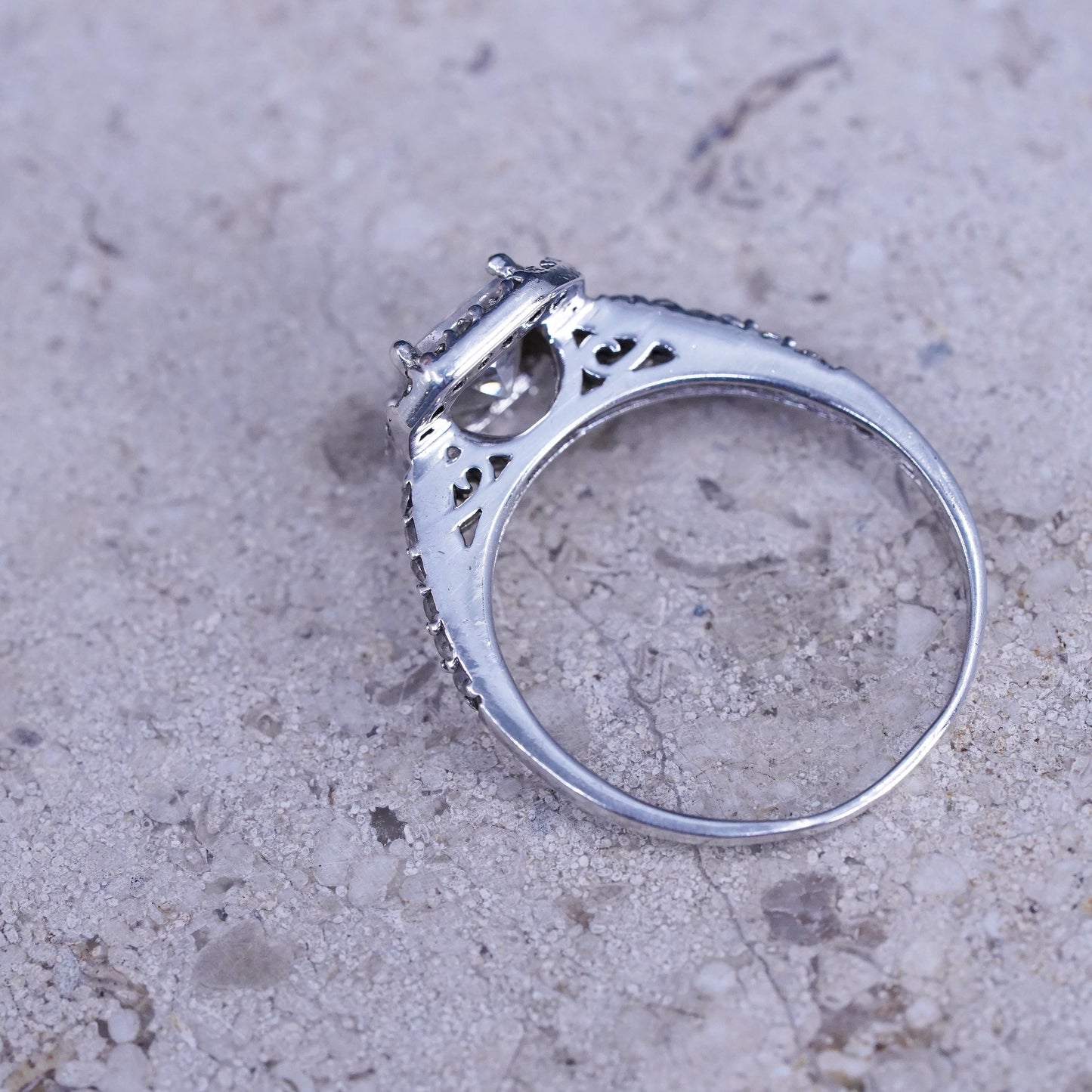 Size 8.25, vintage Sterling 925 silver engagement ring with cluster Cz around