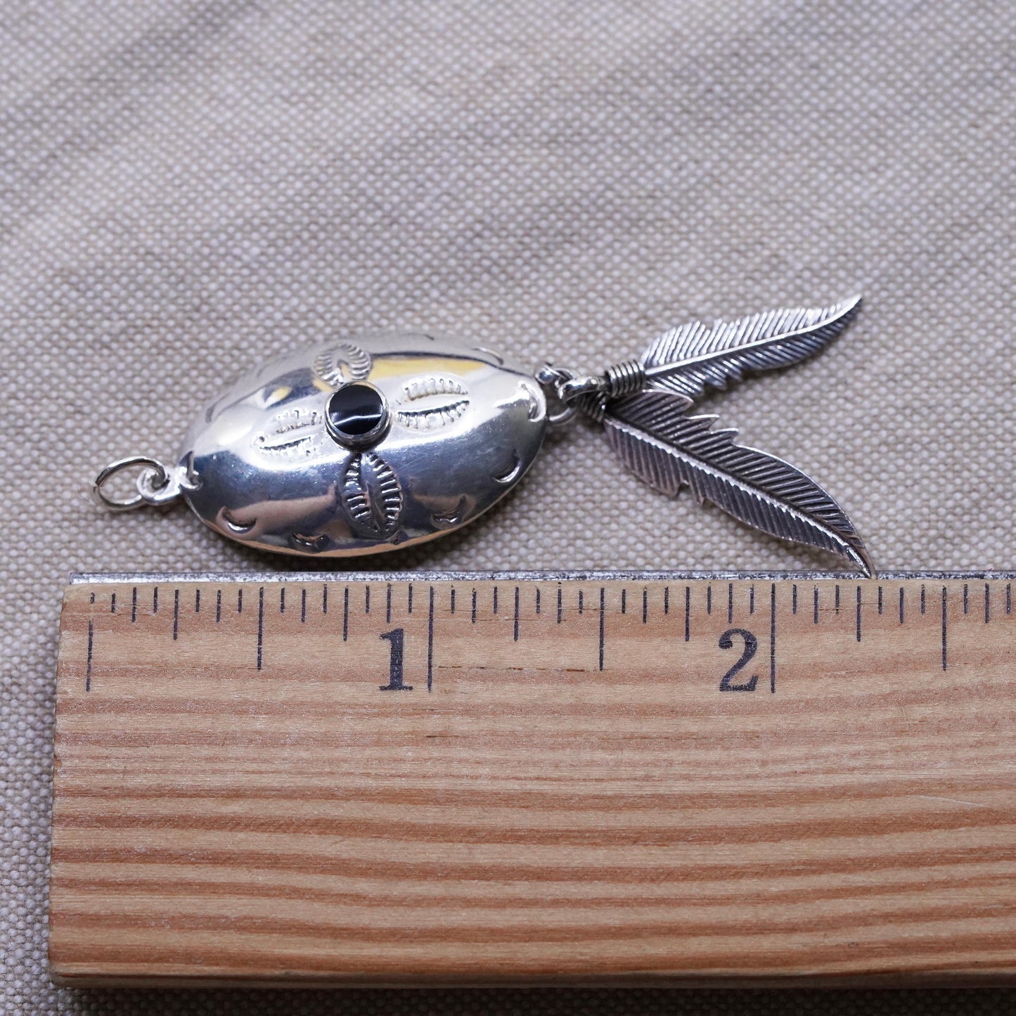 Sterling silver pendant, southwestern style, 2” 925 circle with feather dangle