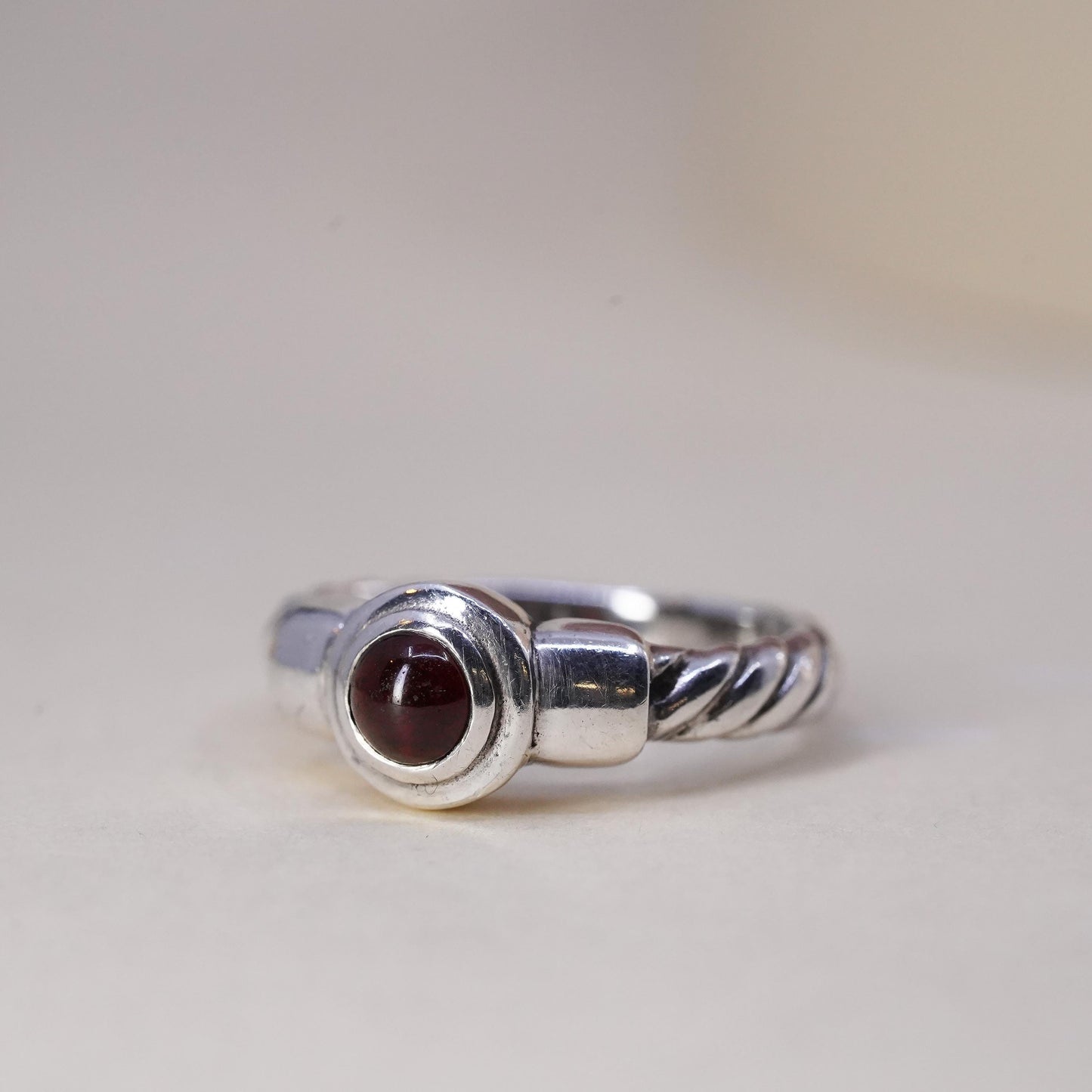 Size 7.75, Vintage sterling 925 silver handmade ring with round garnet