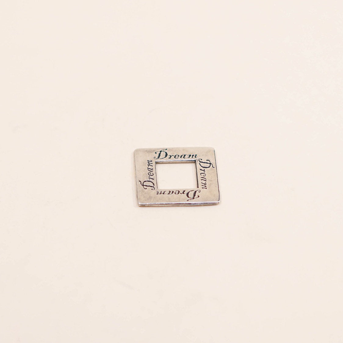 vtg Sterling silver handmade pendant, Hammered 925 square embossed “dream”